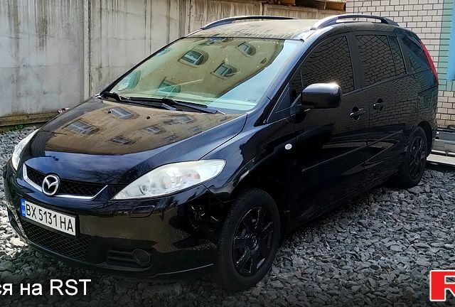 Черный Мазда 5, объемом двигателя 1.8 л и пробегом 250 тыс. км за 5500 $, фото 1 на Automoto.ua