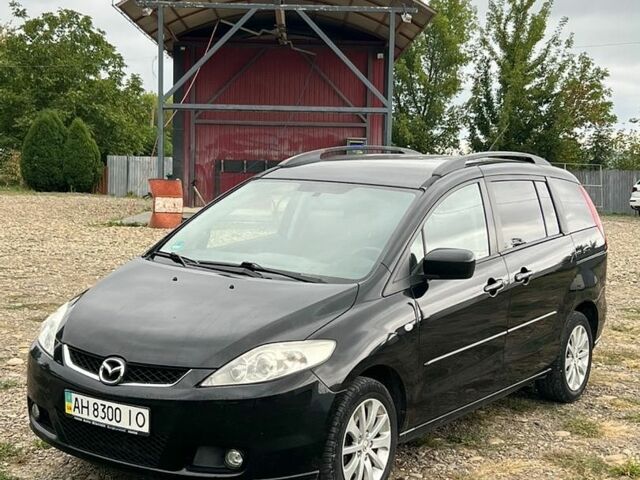 Черный Мазда 5, объемом двигателя 2 л и пробегом 250 тыс. км за 4999 $, фото 1 на Automoto.ua