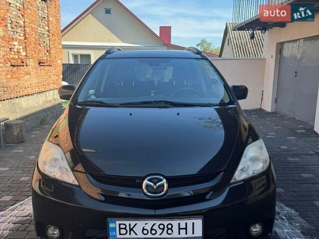 Черный Мазда 5, объемом двигателя 2 л и пробегом 273 тыс. км за 4500 $, фото 1 на Automoto.ua