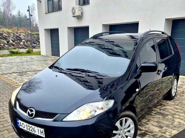 Черный Мазда 5, объемом двигателя 2 л и пробегом 221 тыс. км за 5300 $, фото 1 на Automoto.ua