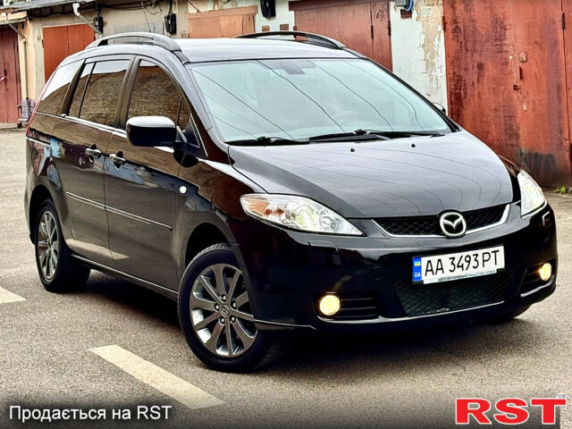 Черный Мазда 5, объемом двигателя 2 л и пробегом 289 тыс. км за 4450 $, фото 1 на Automoto.ua
