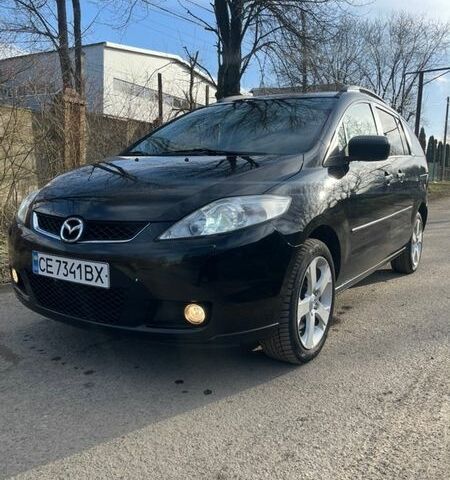 Чорний Мазда 5, об'ємом двигуна 2 л та пробігом 247 тис. км за 4999 $, фото 1 на Automoto.ua
