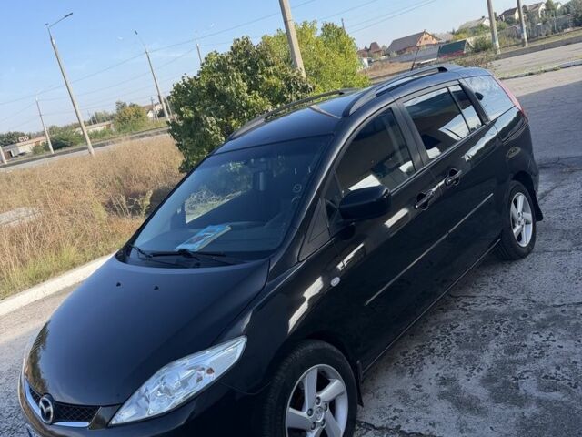 Чорний Мазда 5, об'ємом двигуна 2 л та пробігом 200 тис. км за 5521 $, фото 1 на Automoto.ua