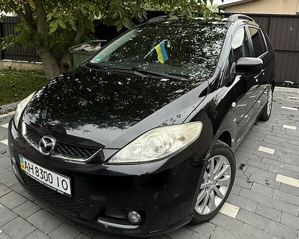 Черный Мазда 5, объемом двигателя 2 л и пробегом 228 тыс. км за 5100 $, фото 1 на Automoto.ua