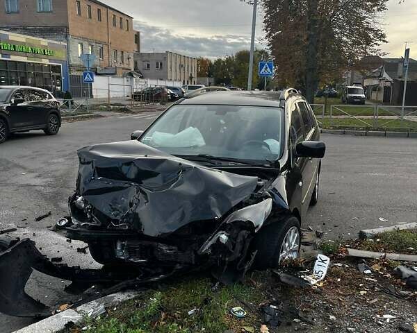 Чорний Мазда 5, об'ємом двигуна 2 л та пробігом 312 тис. км за 2200 $, фото 1 на Automoto.ua