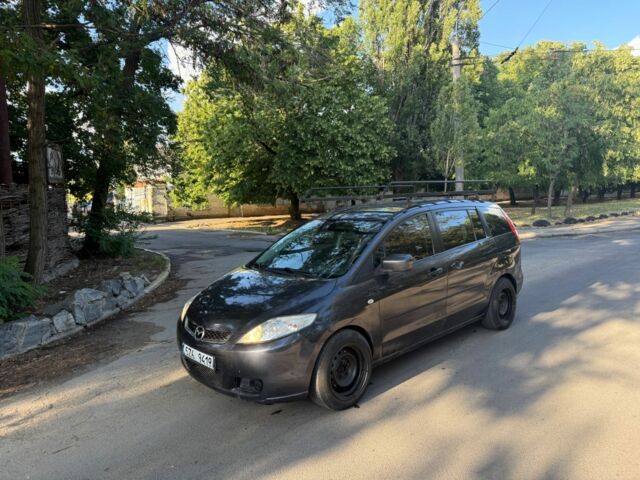 Черный Мазда 5, объемом двигателя 2 л и пробегом 200 тыс. км за 2950 $, фото 1 на Automoto.ua