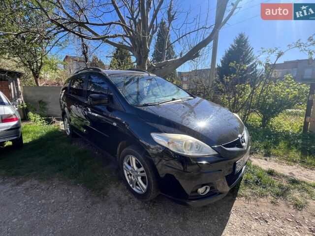 Чорний Мазда 5, об'ємом двигуна 2 л та пробігом 243 тис. км за 6499 $, фото 1 на Automoto.ua