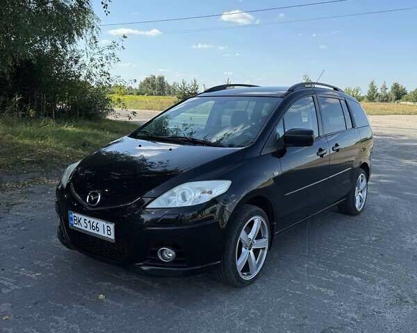 Черный Мазда 5, объемом двигателя 2 л и пробегом 249 тыс. км за 6500 $, фото 1 на Automoto.ua