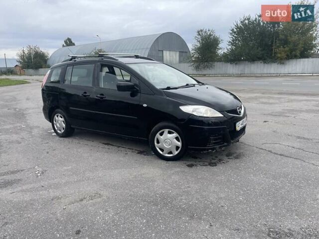 Черный Мазда 5, объемом двигателя 1.8 л и пробегом 302 тыс. км за 4250 $, фото 1 на Automoto.ua