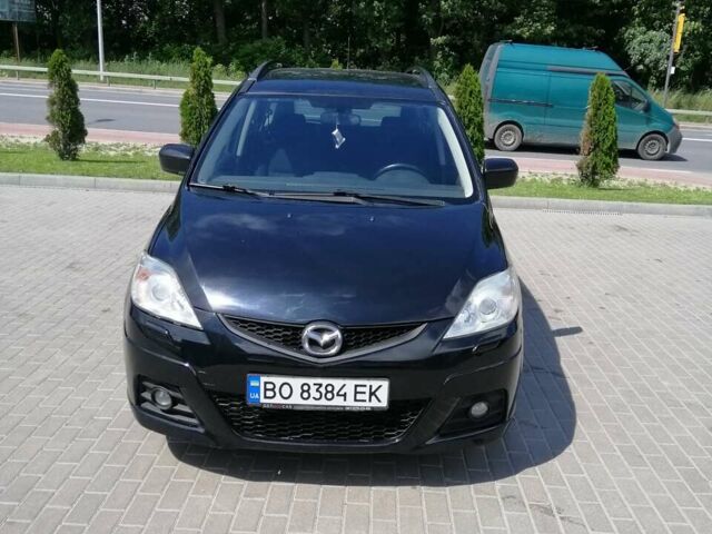 Черный Мазда 5, объемом двигателя 2 л и пробегом 299 тыс. км за 5200 $, фото 1 на Automoto.ua