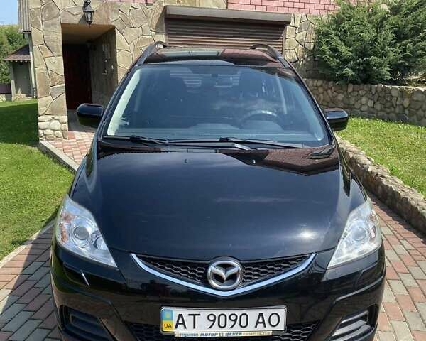 Черный Мазда 5, объемом двигателя 2 л и пробегом 141 тыс. км за 6300 $, фото 1 на Automoto.ua