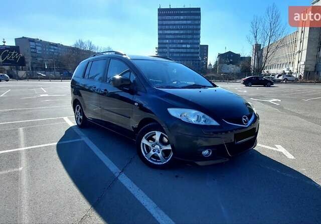 Черный Мазда 5, объемом двигателя 2 л и пробегом 253 тыс. км за 6500 $, фото 1 на Automoto.ua