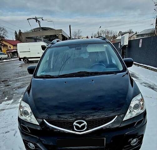 Черный Мазда 5, объемом двигателя 2 л и пробегом 253 тыс. км за 6500 $, фото 1 на Automoto.ua