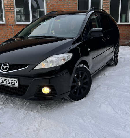 Черный Мазда 5, объемом двигателя 2 л и пробегом 332 тыс. км за 5500 $, фото 1 на Automoto.ua