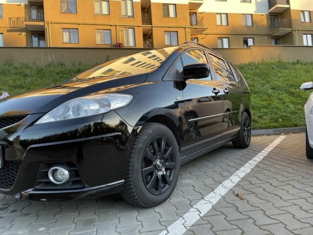 Черный Мазда 5, объемом двигателя 2 л и пробегом 325 тыс. км за 6200 $, фото 1 на Automoto.ua