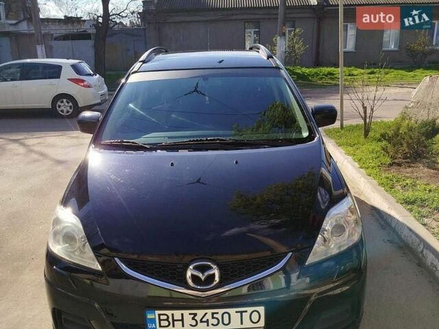 Черный Мазда 5, объемом двигателя 2 л и пробегом 292 тыс. км за 6500 $, фото 1 на Automoto.ua