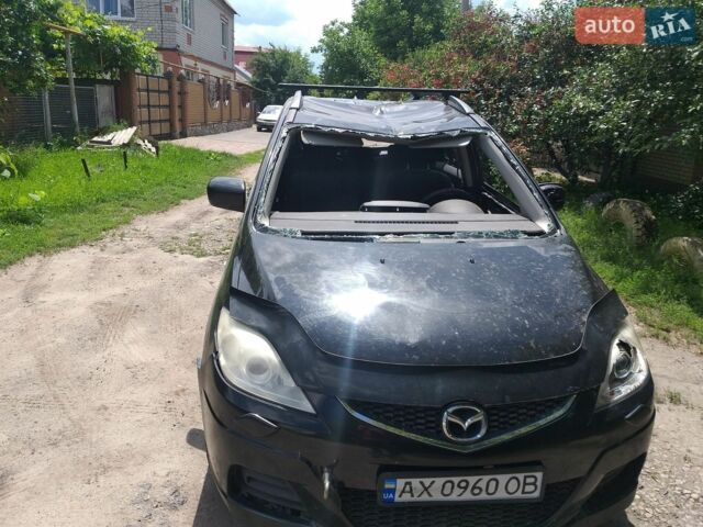 Черный Мазда 5, объемом двигателя 2 л и пробегом 260 тыс. км за 2200 $, фото 1 на Automoto.ua