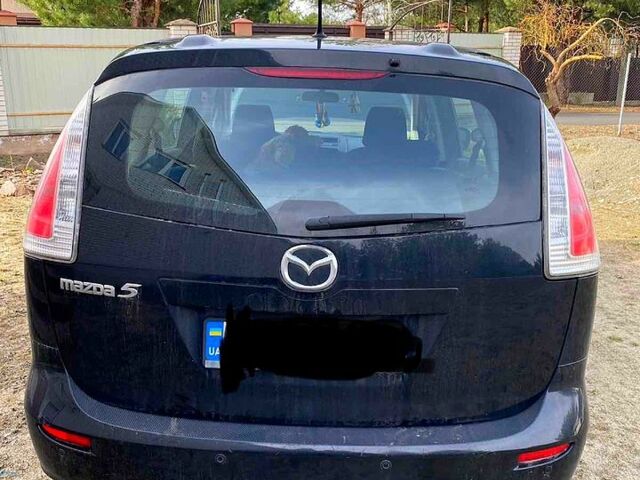Черный Мазда 5, объемом двигателя 1.8 л и пробегом 235 тыс. км за 6000 $, фото 1 на Automoto.ua