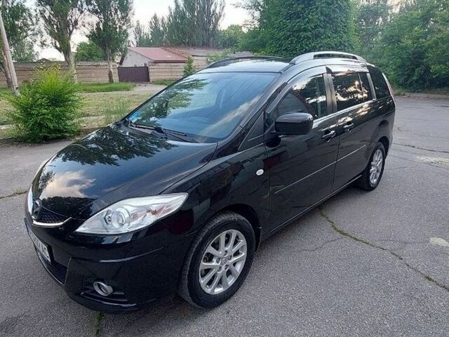Черный Мазда 5, объемом двигателя 1.8 л и пробегом 248 тыс. км за 6500 $, фото 1 на Automoto.ua