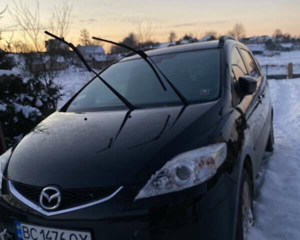Черный Мазда 5, объемом двигателя 1.8 л и пробегом 173 тыс. км за 8500 $, фото 1 на Automoto.ua