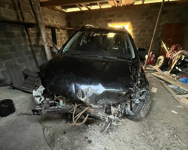 Черный Мазда 5, объемом двигателя 2 л и пробегом 270 тыс. км за 2500 $, фото 1 на Automoto.ua