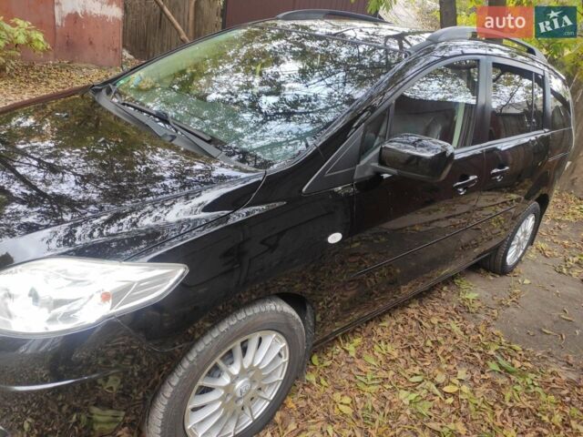 Черный Мазда 5, объемом двигателя 2 л и пробегом 212 тыс. км за 6600 $, фото 1 на Automoto.ua