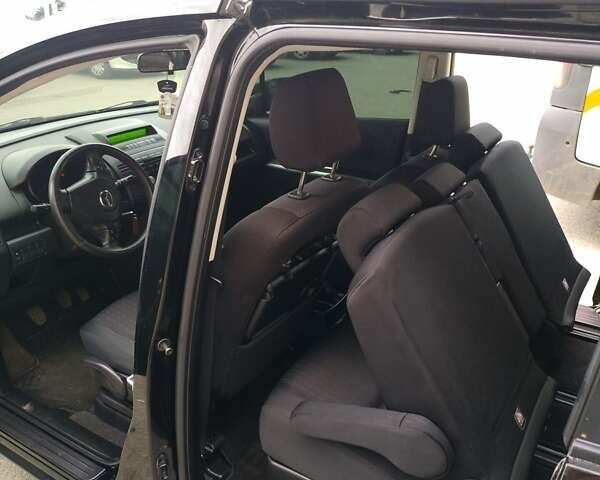 Чорний Мазда 5, об'ємом двигуна 2 л та пробігом 219 тис. км за 6800 $, фото 1 на Automoto.ua