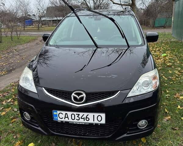 Черный Мазда 5, объемом двигателя 2 л и пробегом 228 тыс. км за 6500 $, фото 1 на Automoto.ua