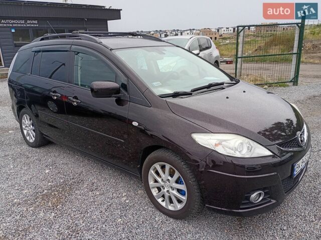 Черный Мазда 5, объемом двигателя 2 л и пробегом 242 тыс. км за 5450 $, фото 1 на Automoto.ua