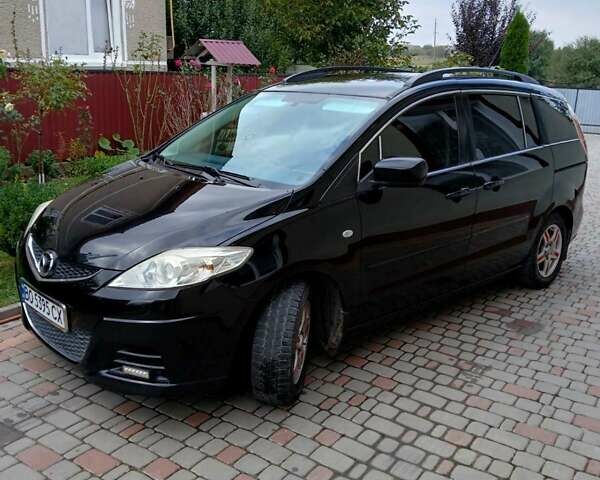 Черный Мазда 5, объемом двигателя 2 л и пробегом 273 тыс. км за 5999 $, фото 1 на Automoto.ua