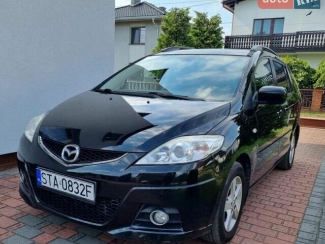 Черный Мазда 5, объемом двигателя 1.8 л и пробегом 211 тыс. км за 5300 $, фото 1 на Automoto.ua