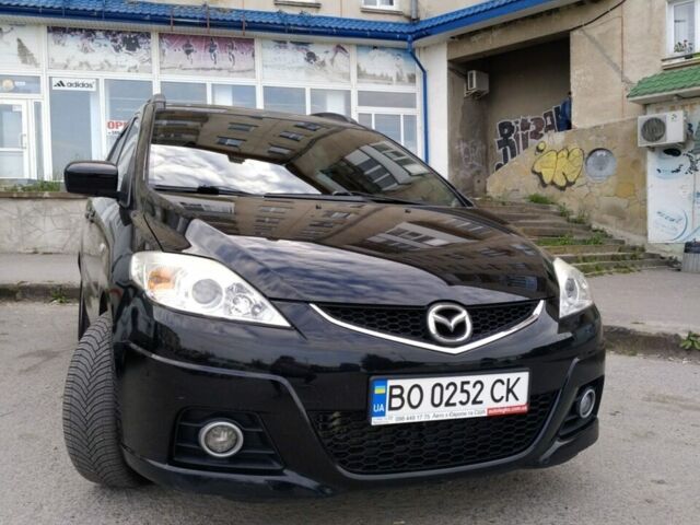 Черный Мазда 5, объемом двигателя 2 л и пробегом 219 тыс. км за 6800 $, фото 1 на Automoto.ua