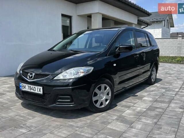 Черный Мазда 5, объемом двигателя 1.8 л и пробегом 188 тыс. км за 6500 $, фото 1 на Automoto.ua