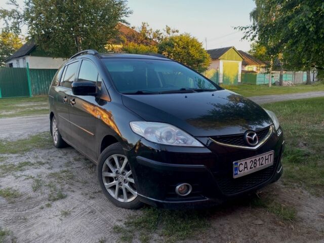 Черный Мазда 5, объемом двигателя 2 л и пробегом 219 тыс. км за 5999 $, фото 1 на Automoto.ua