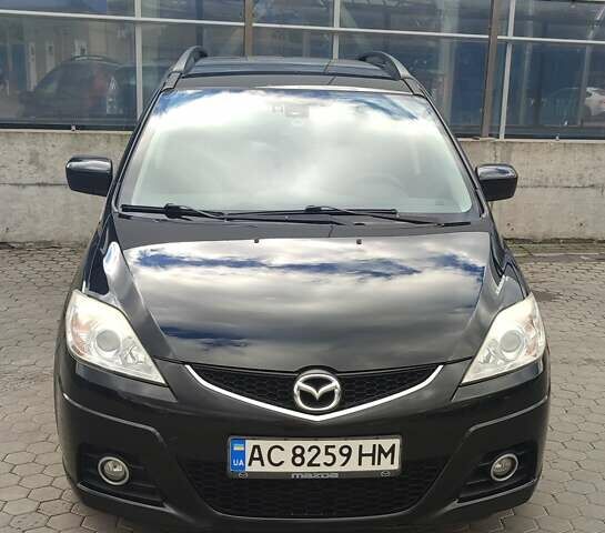 Черный Мазда 5, объемом двигателя 2 л и пробегом 244 тыс. км за 6700 $, фото 1 на Automoto.ua