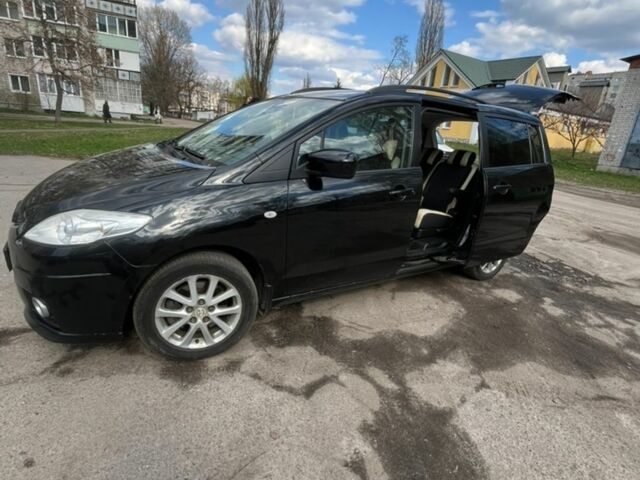 Черный Мазда 5, объемом двигателя 2 л и пробегом 257 тыс. км за 6300 $, фото 1 на Automoto.ua