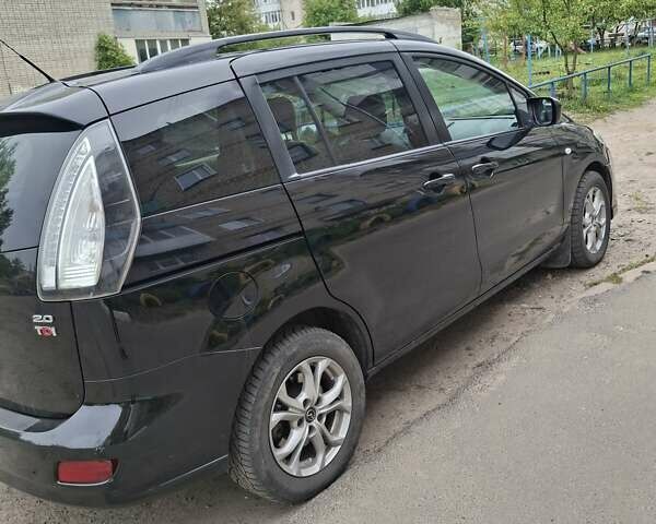Черный Мазда 5, объемом двигателя 2 л и пробегом 202 тыс. км за 7200 $, фото 1 на Automoto.ua