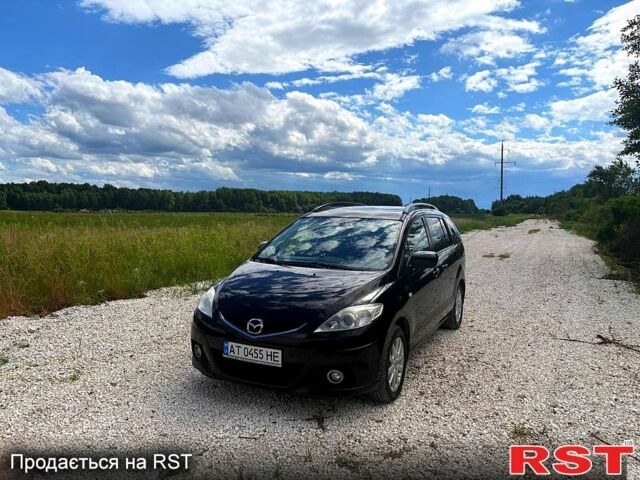 Черный Мазда 5, объемом двигателя 2 л и пробегом 260 тыс. км за 5500 $, фото 1 на Automoto.ua
