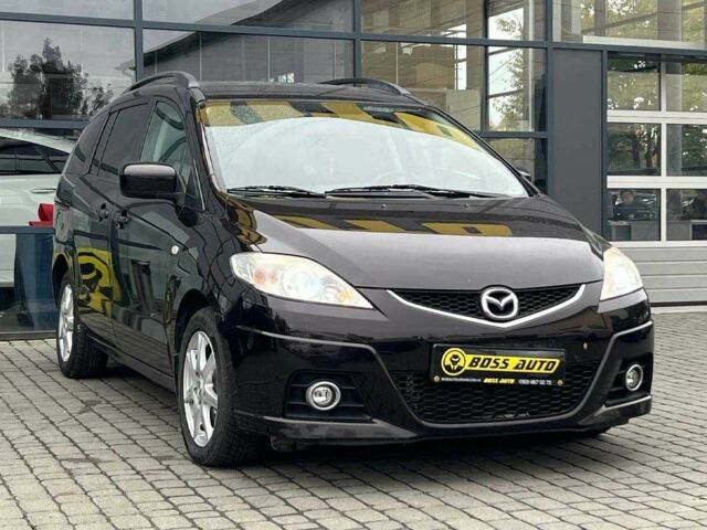 Черный Мазда 5, объемом двигателя 2 л и пробегом 161 тыс. км за 8000 $, фото 1 на Automoto.ua