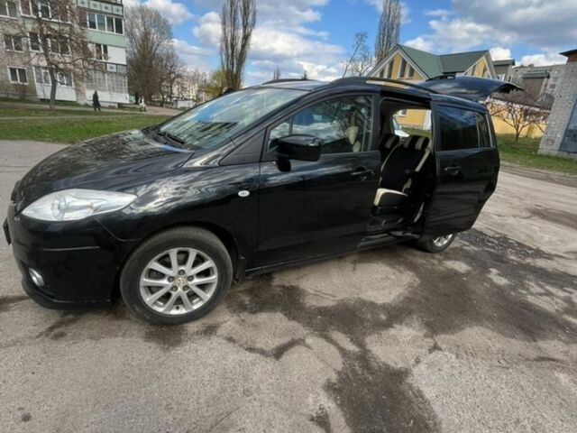 Черный Мазда 5, объемом двигателя 2 л и пробегом 257 тыс. км за 6300 $, фото 1 на Automoto.ua