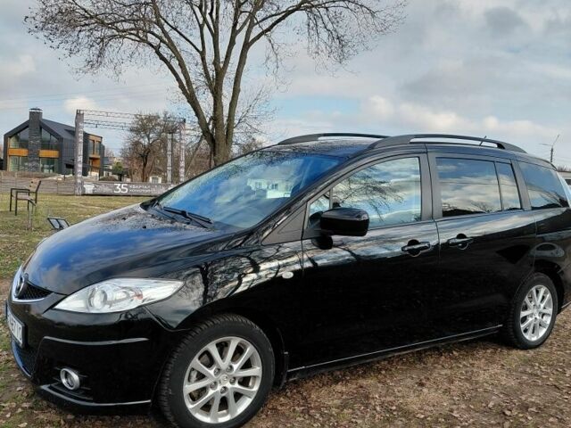 Черный Мазда 5, объемом двигателя 2 л и пробегом 250 тыс. км за 6598 $, фото 1 на Automoto.ua