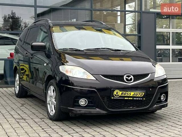 Черный Мазда 5, объемом двигателя 2 л и пробегом 161 тыс. км за 8000 $, фото 1 на Automoto.ua