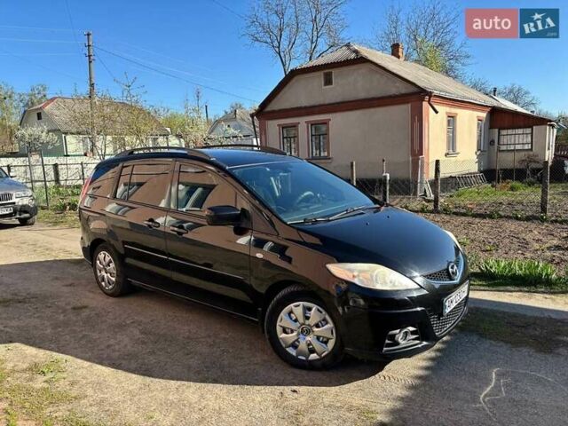 Черный Мазда 5, объемом двигателя 2 л и пробегом 277 тыс. км за 6850 $, фото 1 на Automoto.ua