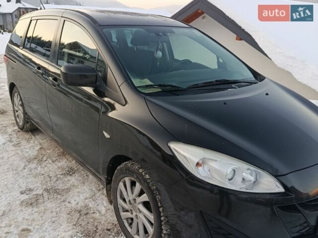 Черный Мазда 5, объемом двигателя 1.6 л и пробегом 333 тыс. км за 7000 $, фото 1 на Automoto.ua