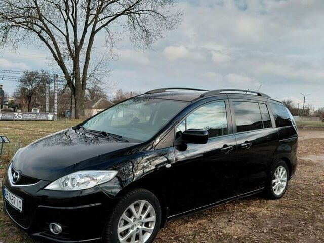 Черный Мазда 5, объемом двигателя 2 л и пробегом 246 тыс. км за 7000 $, фото 1 на Automoto.ua