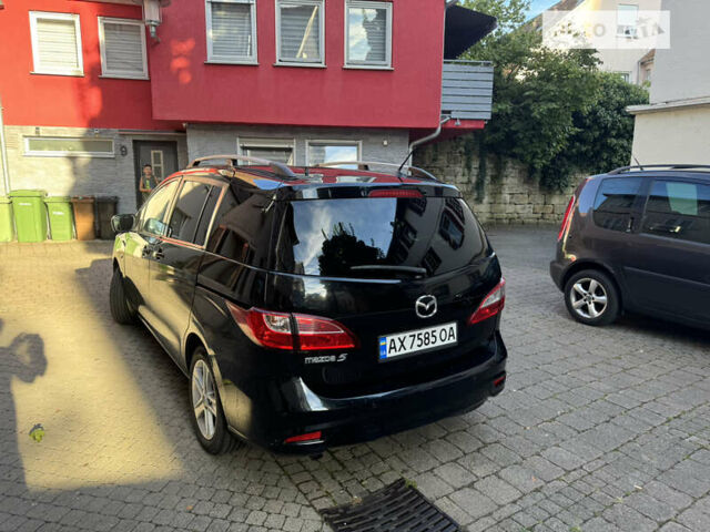 Черный Мазда 5, объемом двигателя 1.8 л и пробегом 270 тыс. км за 7000 $, фото 1 на Automoto.ua