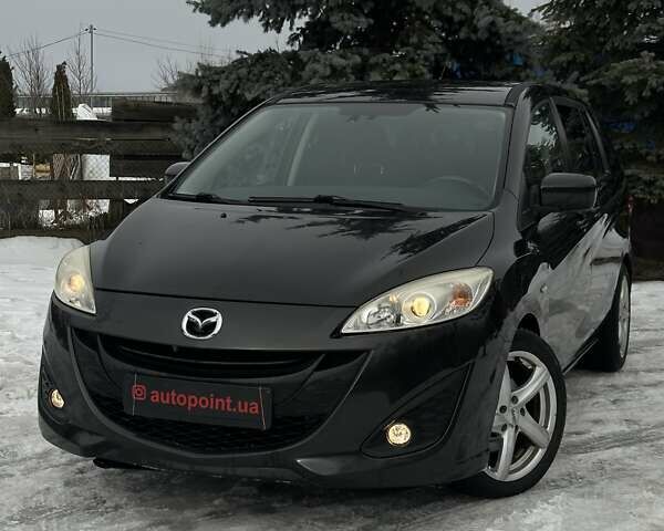 Черный Мазда 5, объемом двигателя 1.56 л и пробегом 274 тыс. км за 6700 $, фото 1 на Automoto.ua