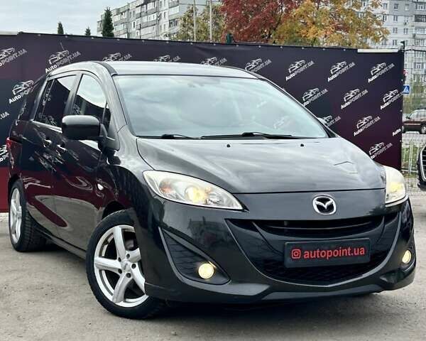 Черный Мазда 5, объемом двигателя 1.56 л и пробегом 274 тыс. км за 7000 $, фото 1 на Automoto.ua