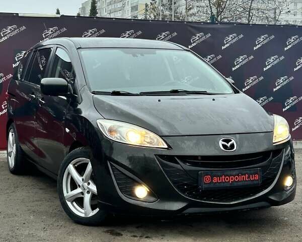 Черный Мазда 5, объемом двигателя 1.56 л и пробегом 274 тыс. км за 6500 $, фото 1 на Automoto.ua