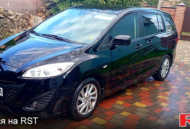 Черный Мазда 5, объемом двигателя 1.8 л и пробегом 26000 тыс. км за 8000 $, фото 1 на Automoto.ua